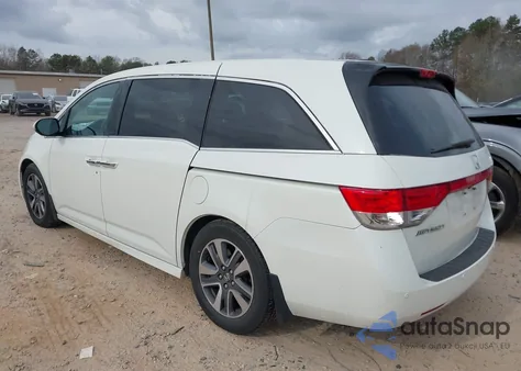 2014 Honda Odyssey Touring/Touring Elite z USA, uszkodzony, nr VIN 5FNRL5H97EB077018
